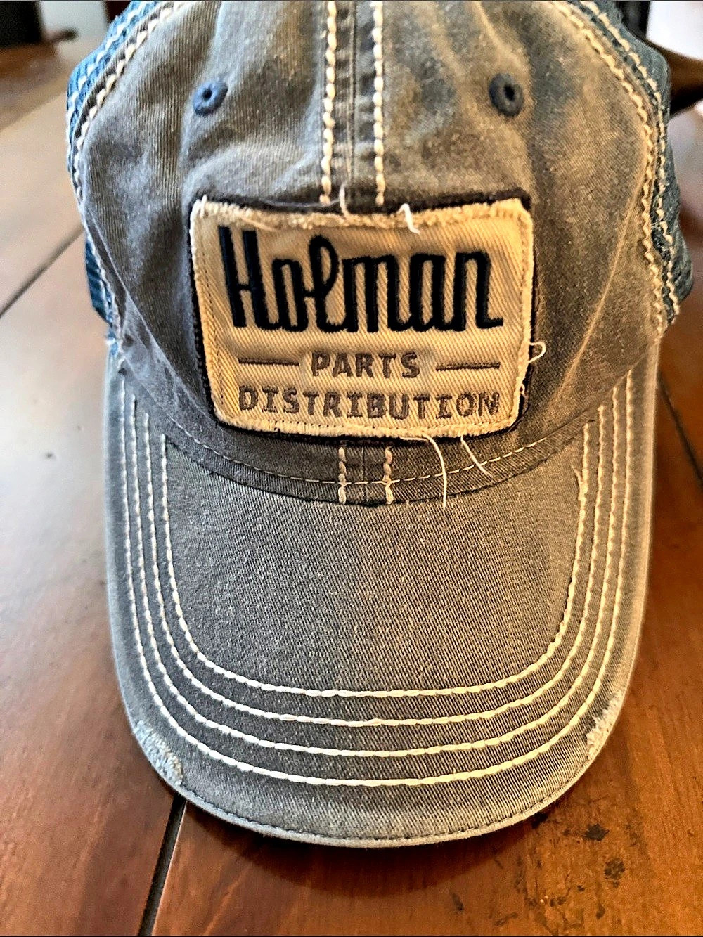 AcMan Mesh Trucker Hat in Blue